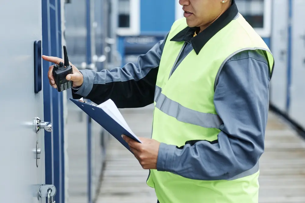 Warehouse security professional inspecting secure storage operations